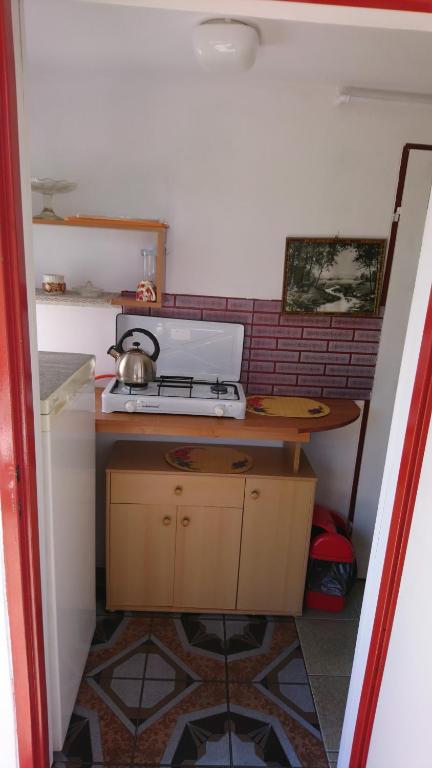 Kuchyň nebo kuchyňský kout v ubytování Dom Bursztynek - domek murowany