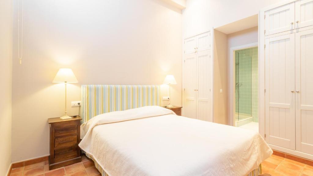 Posteľ alebo postele v izbe v ubytovaní Real Agua Amarga Las Villas