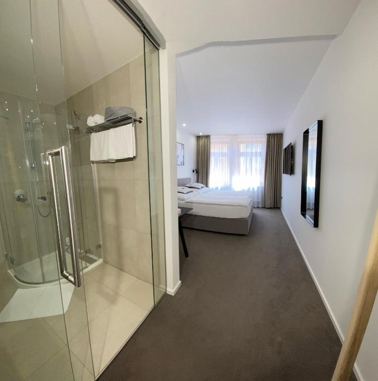 Koupelna v ubytování Rozmaryn Hotel B&B