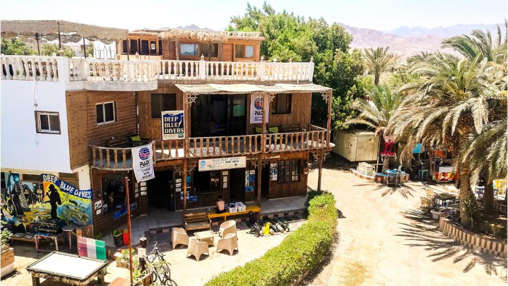 an overhead view of a house with a balcony at Deep Blue Divers Hostel Dahab in Dahab