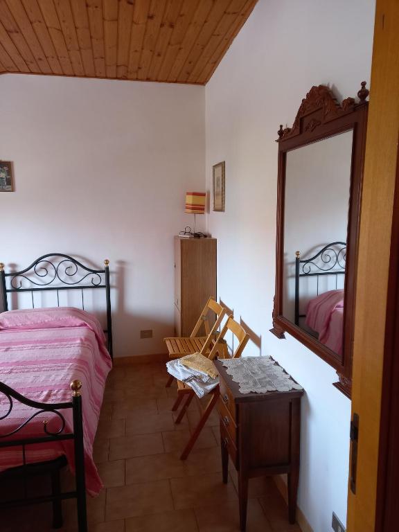 Postel nebo postele na pokoji v ubytování B&B Isabella