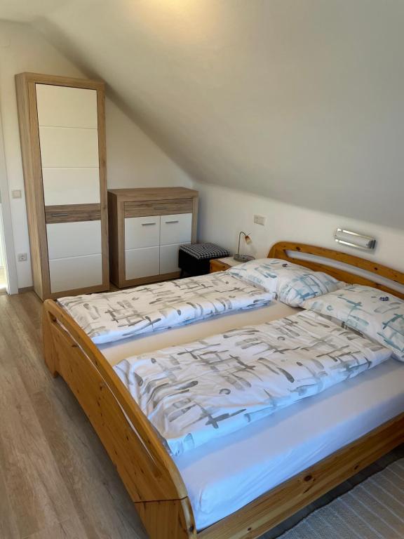 Letto o letti in una camera di Ferienwohnungen Rasinger
