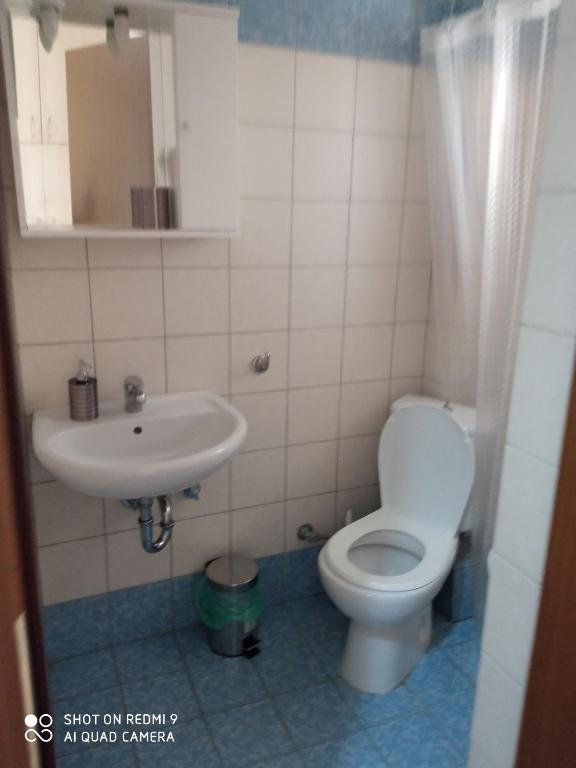 Koupelna v ubytování HOME