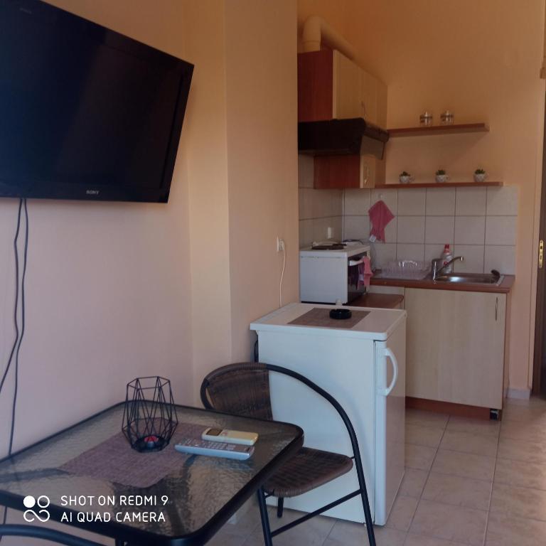 Kuchyň nebo kuchyňský kout v ubytování HOME