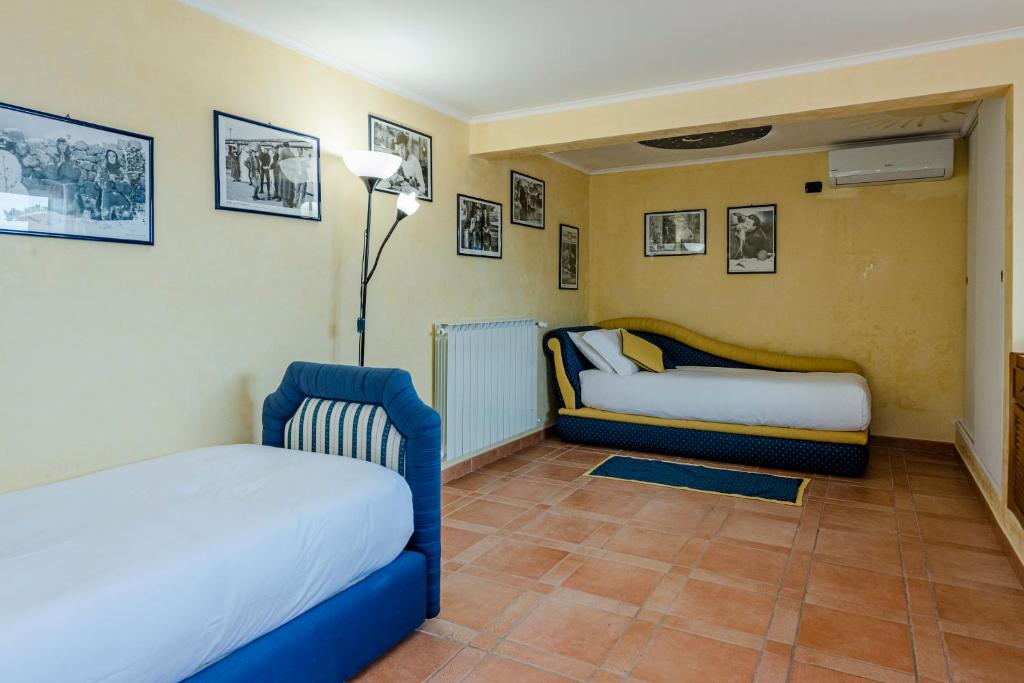 Postel nebo postele na pokoji v ubytování Villa Simonetta