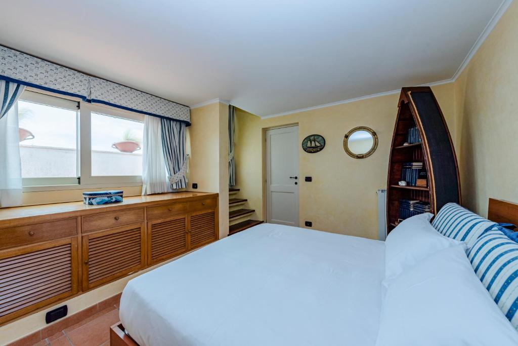 Postel nebo postele na pokoji v ubytování Villa Simonetta
