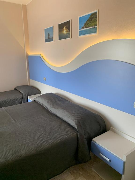 Postel nebo postele na pokoji v ubytování Hotel Moderno - Bed & Breakfast