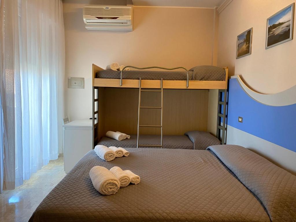 Postel nebo postele na pokoji v ubytování Hotel Moderno - Bed & Breakfast