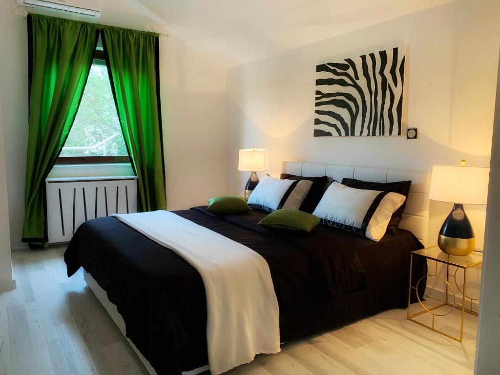 Posteľ alebo postele v izbe v ubytovaní Vacation Home Vidučić