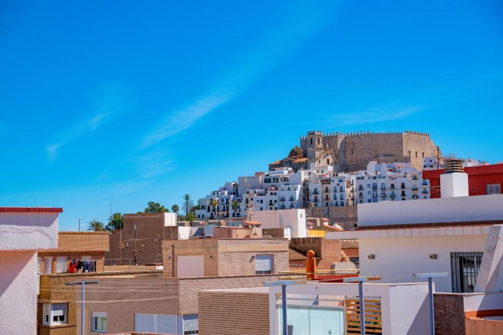 a view of the acropolis from the roofs of buildings at Apartamento CA VALEN 1 in Peñíscola