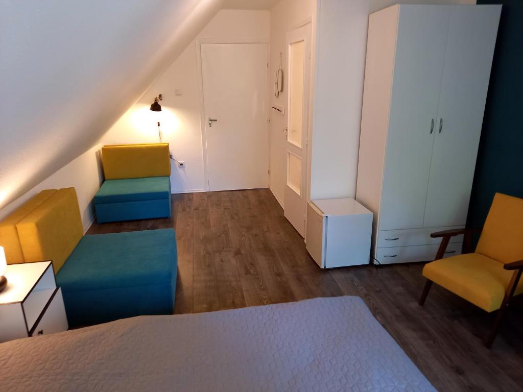 Postel nebo postele na pokoji v ubytování Diókert Vendégház Sopron