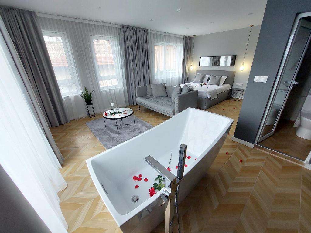Postel nebo postele na pokoji v ubytování Студио с вана и гледка в "The House" с Термална зона