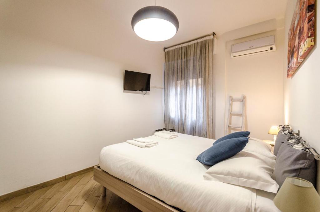 A bed or beds in a room at Casa Galliera