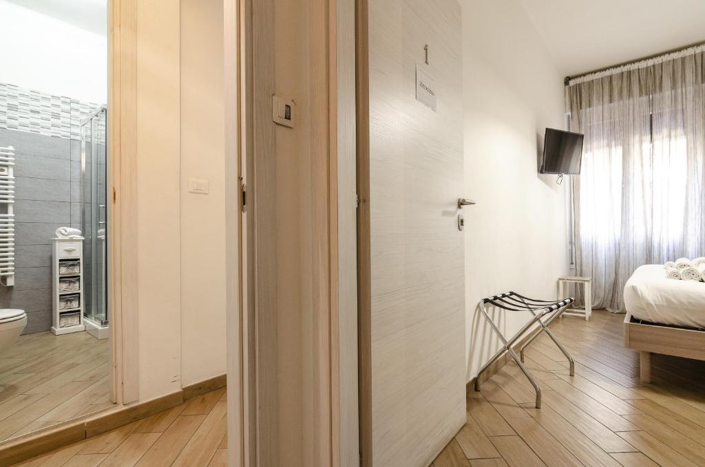 A bed or beds in a room at Casa Galliera