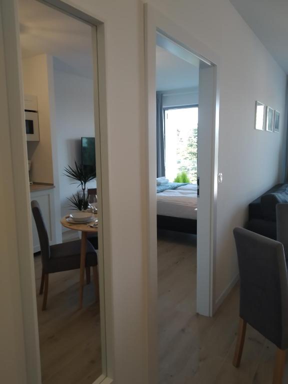 Televízia a/alebo spoločenská miestnosť v ubytovaní Balticus Apartament Premium