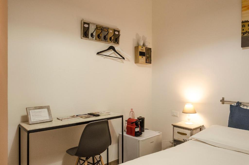 A bed or beds in a room at Casa Galliera
