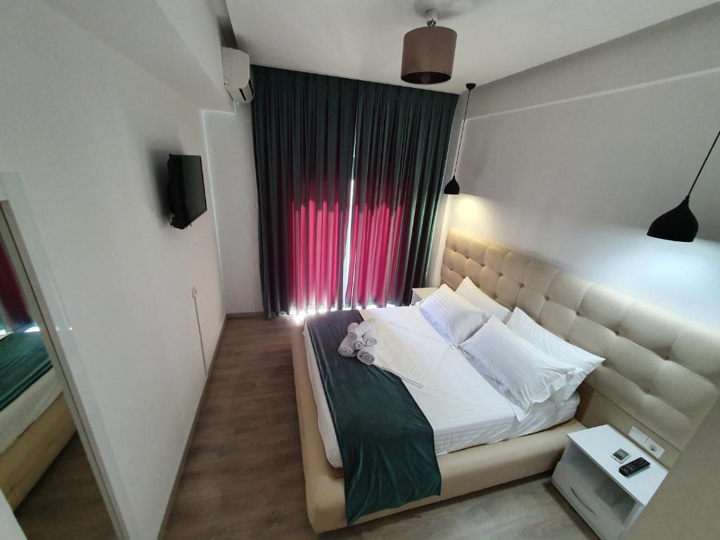 Postel nebo postele na pokoji v ubytování Hotel Aloha