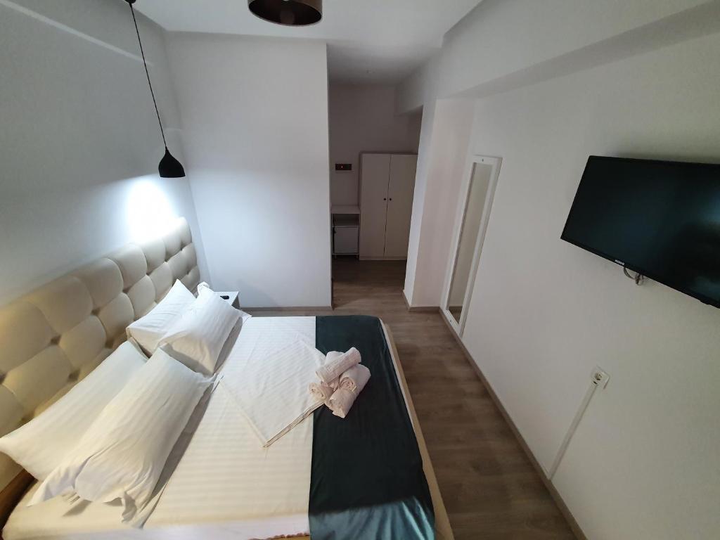 Postel nebo postele na pokoji v ubytování Hotel Aloha