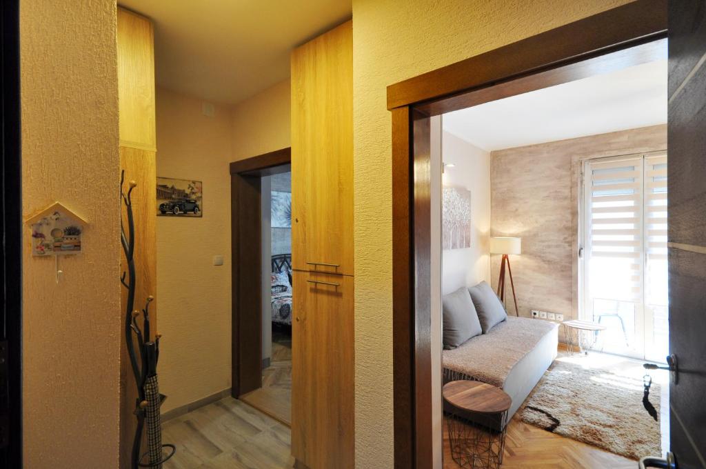Postel nebo postele na pokoji v ubytování Apartman Lora