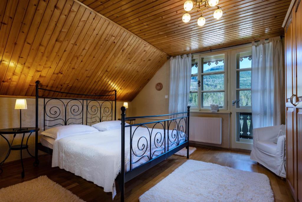 Postel nebo postele na pokoji v ubytování Penzion Enrico