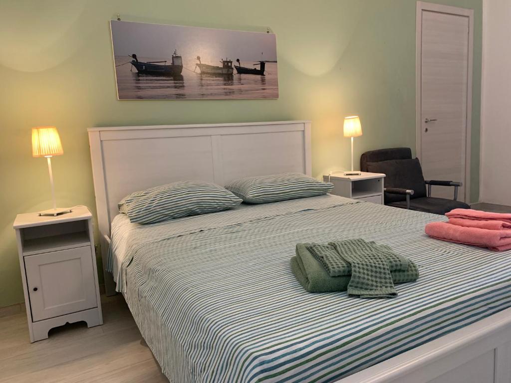 A bed or beds in a room at Librari - Quality confort