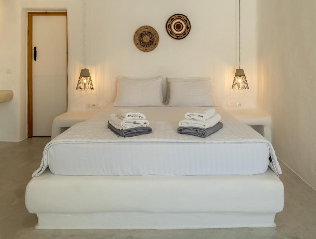 Postel nebo postele na pokoji v ubytování Irida Vacation suites