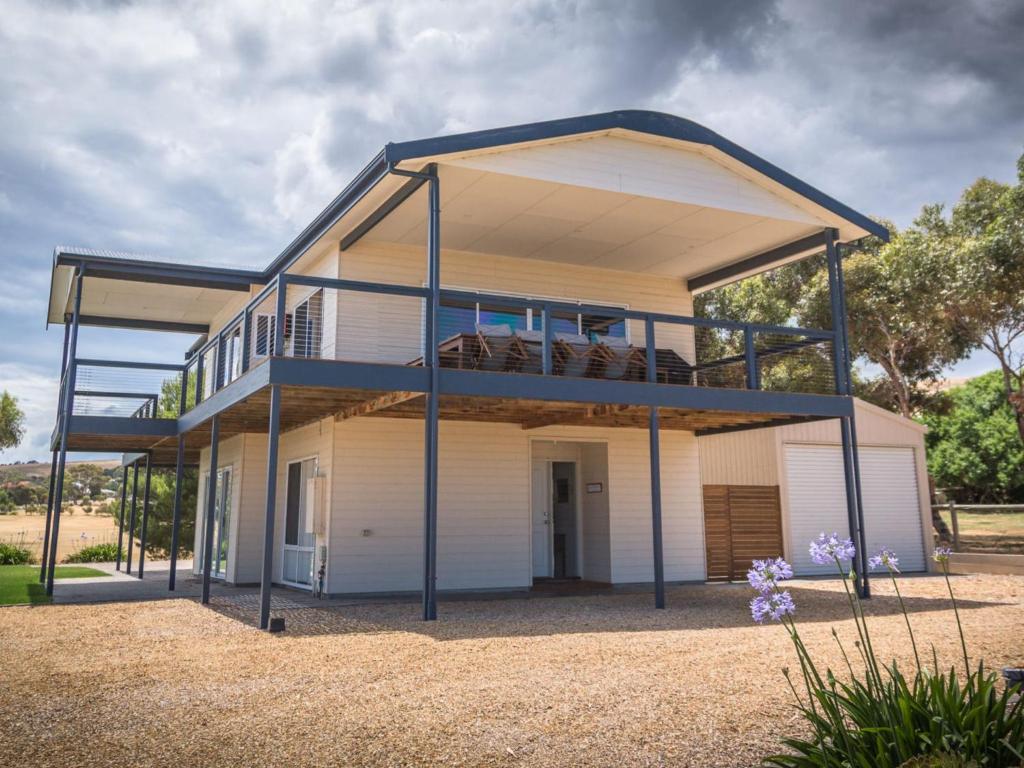 a house with a large roof with a second floor at Shearers Rest 5 Davey Road in Normanville