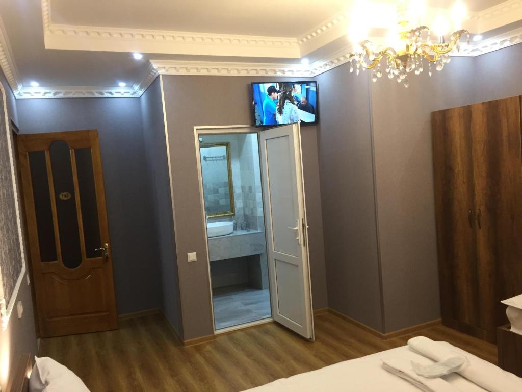 Postel nebo postele na pokoji v ubytování HOTEL COMFORT