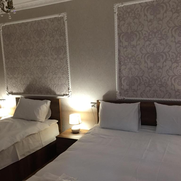Postel nebo postele na pokoji v ubytování HOTEL COMFORT