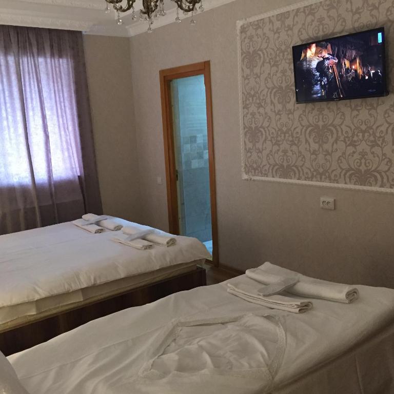 Postel nebo postele na pokoji v ubytování HOTEL COMFORT