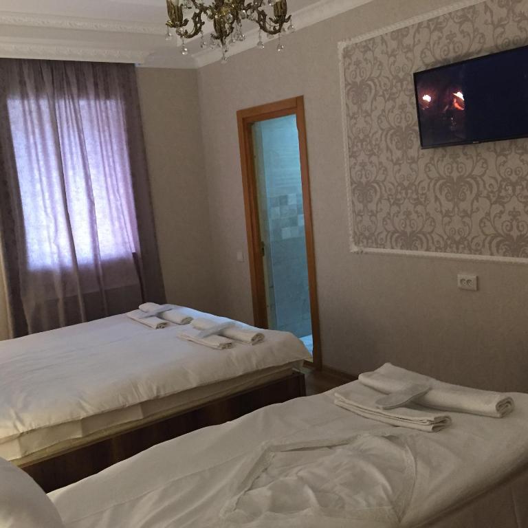 Postel nebo postele na pokoji v ubytování HOTEL COMFORT