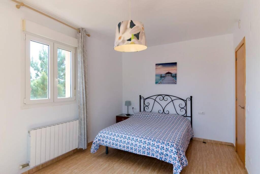 Postel nebo postele na pokoji v ubytování Marimuntanya