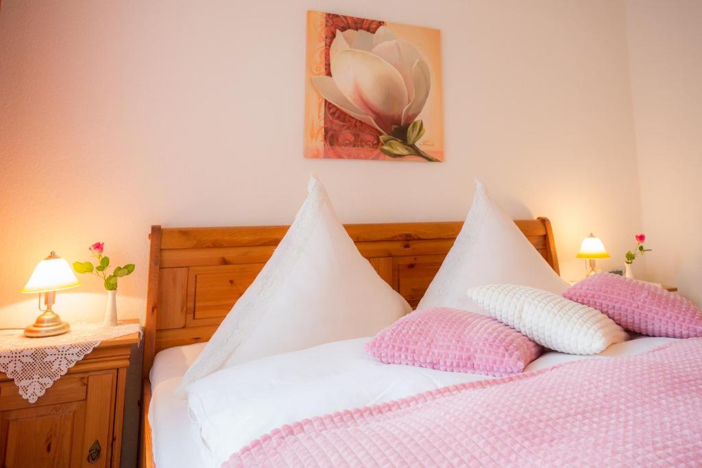 Postel nebo postele na pokoji v ubytování Hotel Restaurant Rehberg