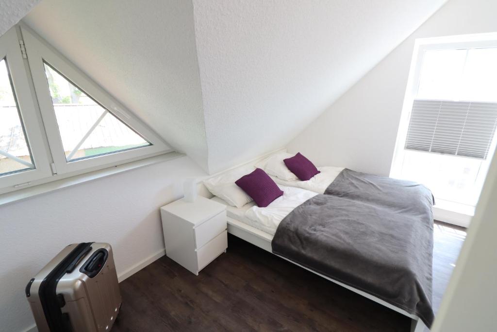 Postel nebo postele na pokoji v ubytování Ferienhaus im Angerdorf