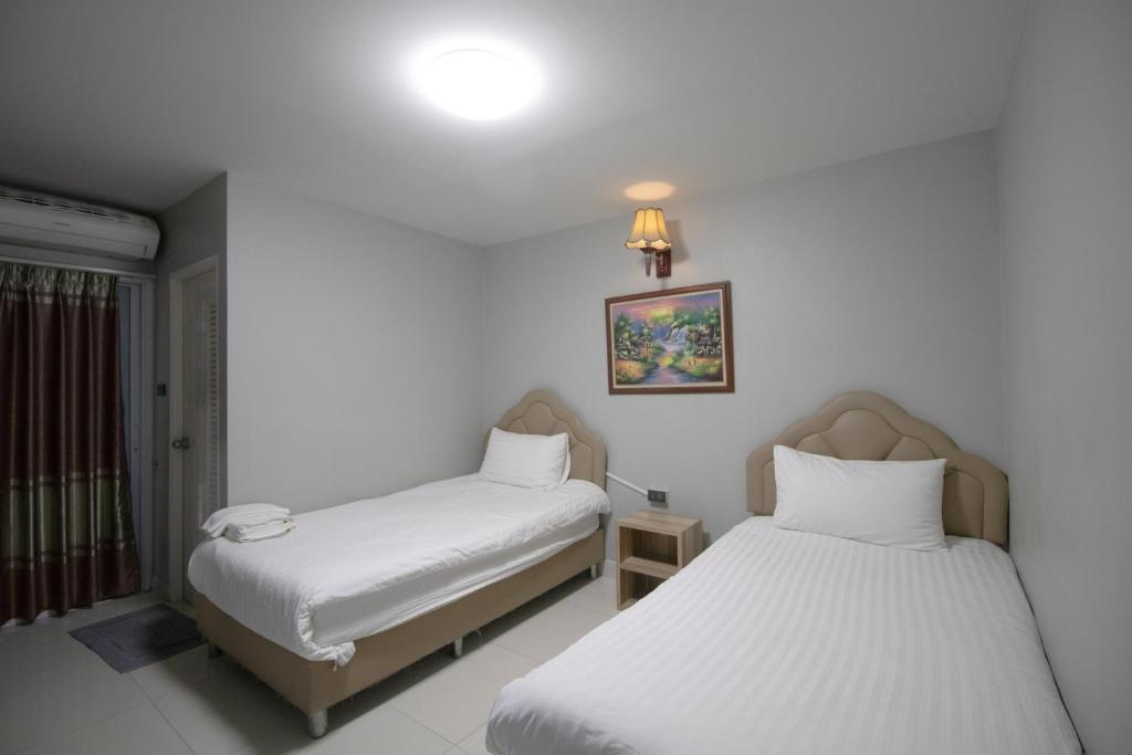 Kun Hotel - غرفة توأم قياسية