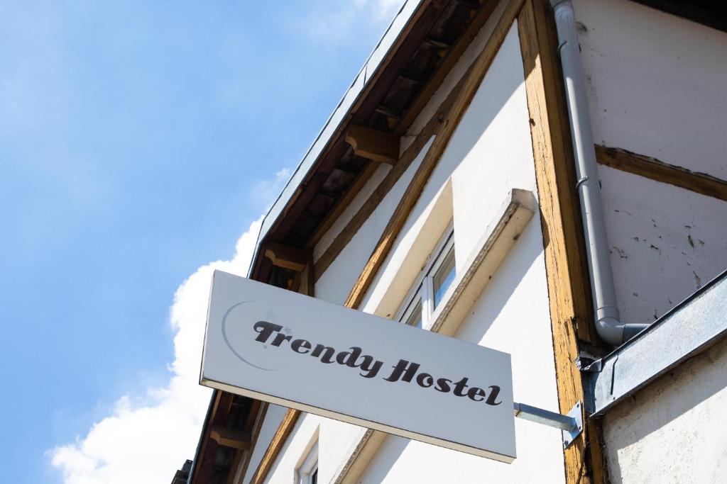 a sign for a therapy hospital on the side of a building at trendy hostel in Ivry-sur-Seine
