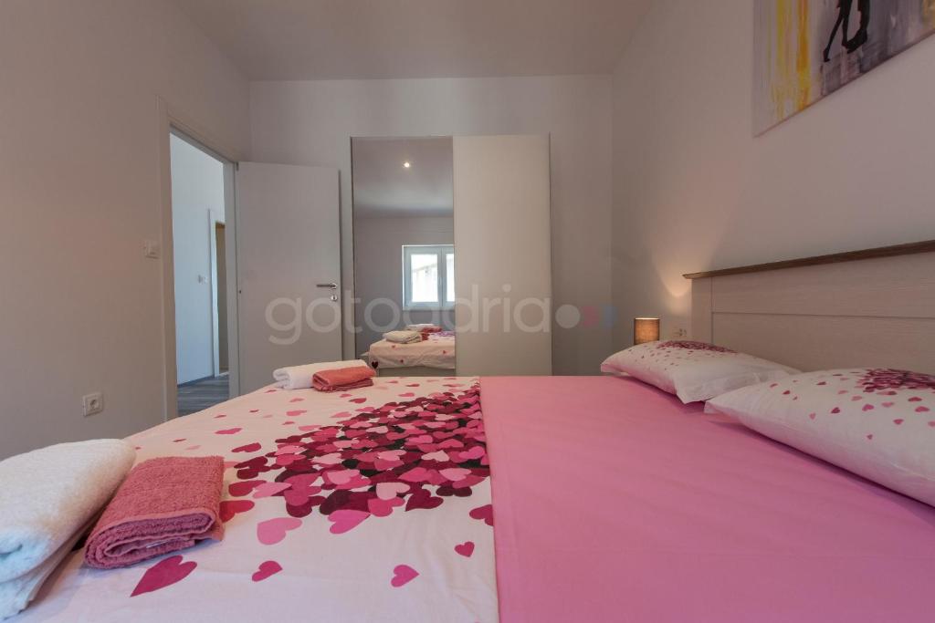 Posteľ alebo postele v izbe v ubytovaní Seaview Penthouse Milano