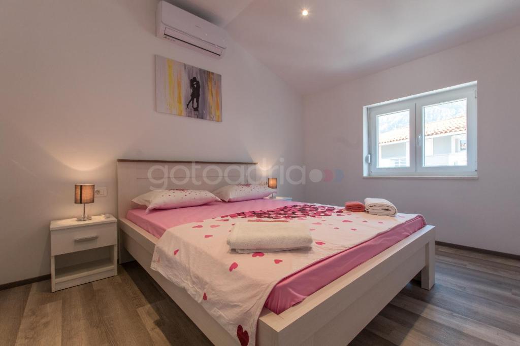 Posteľ alebo postele v izbe v ubytovaní Seaview Penthouse Milano