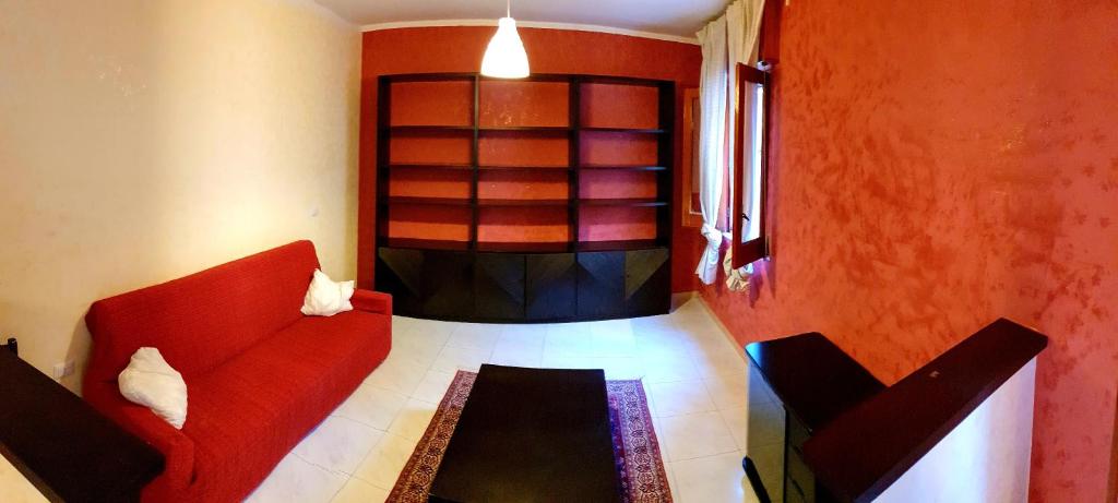 A bed or beds in a room at Appartamento In Paese