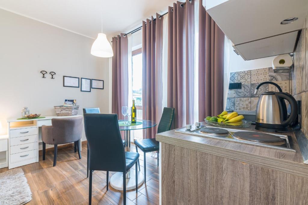 Kuchyňa alebo kuchynka v ubytovaní Apartman Chiara