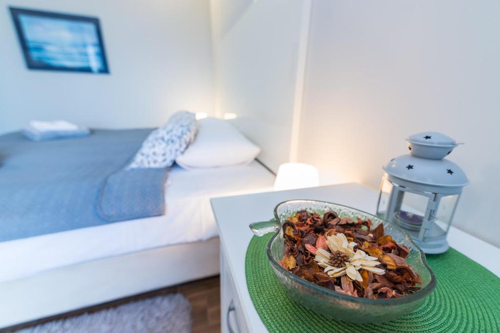 Posteľ alebo postele v izbe v ubytovaní Apartman Chiara