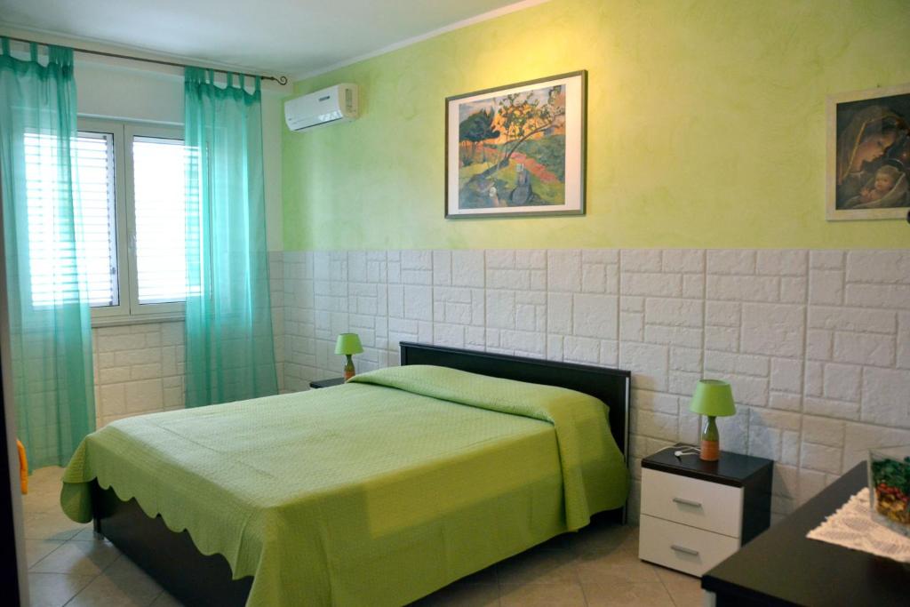 Postel nebo postele na pokoji v ubytování Casa Fusco