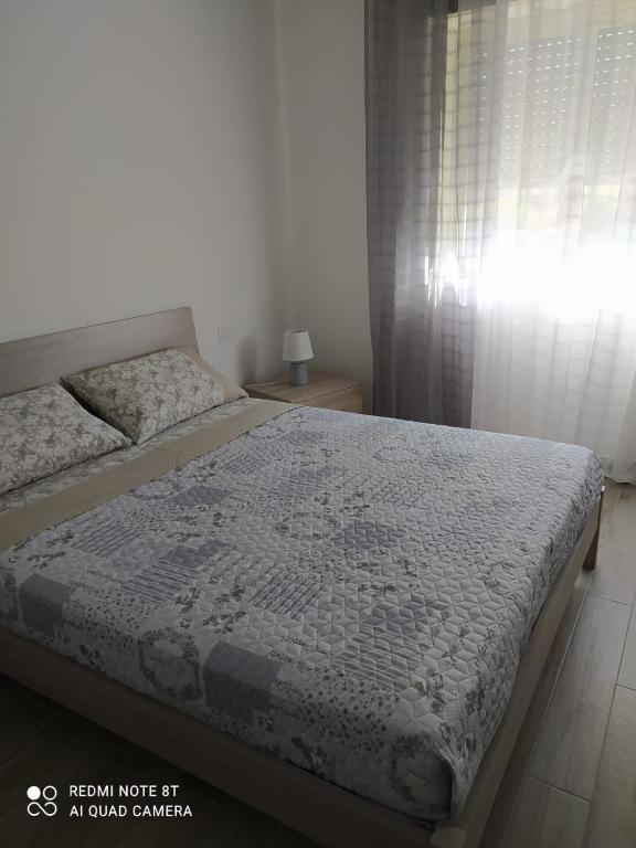 Posteľ alebo postele v izbe v ubytovaní Appartamenti Scilla e Cariddi Giardini Naxos