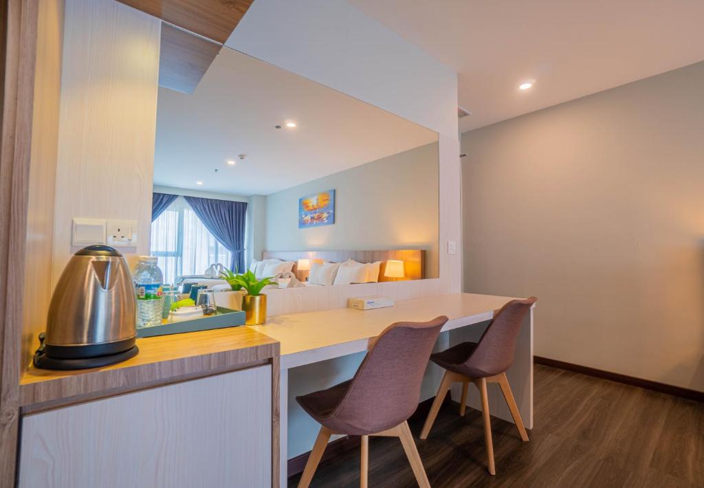 Postel nebo postele na pokoji v ubytování FLYPOD Hotel