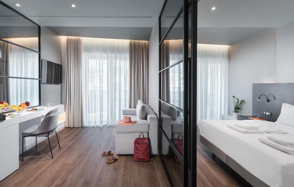 Postel nebo postele na pokoji v ubytování Ivis 4 Boutique Hotel