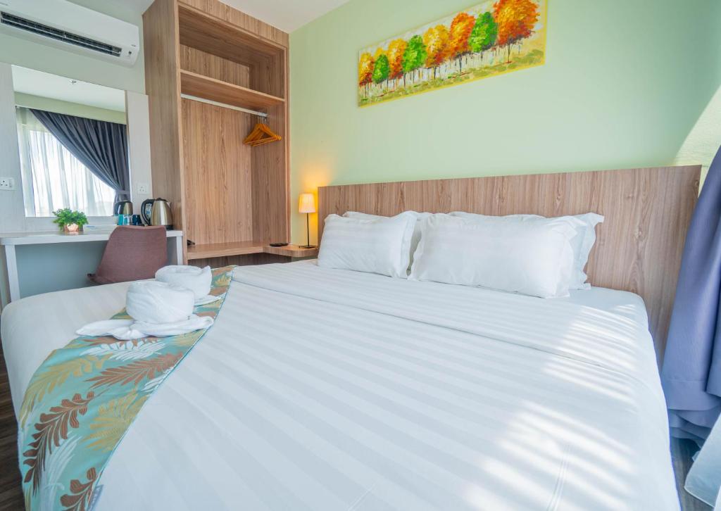 Postel nebo postele na pokoji v ubytování FLYPOD Hotel