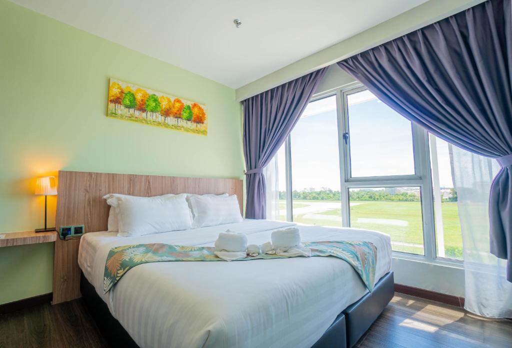 Postel nebo postele na pokoji v ubytování FLYPOD Hotel