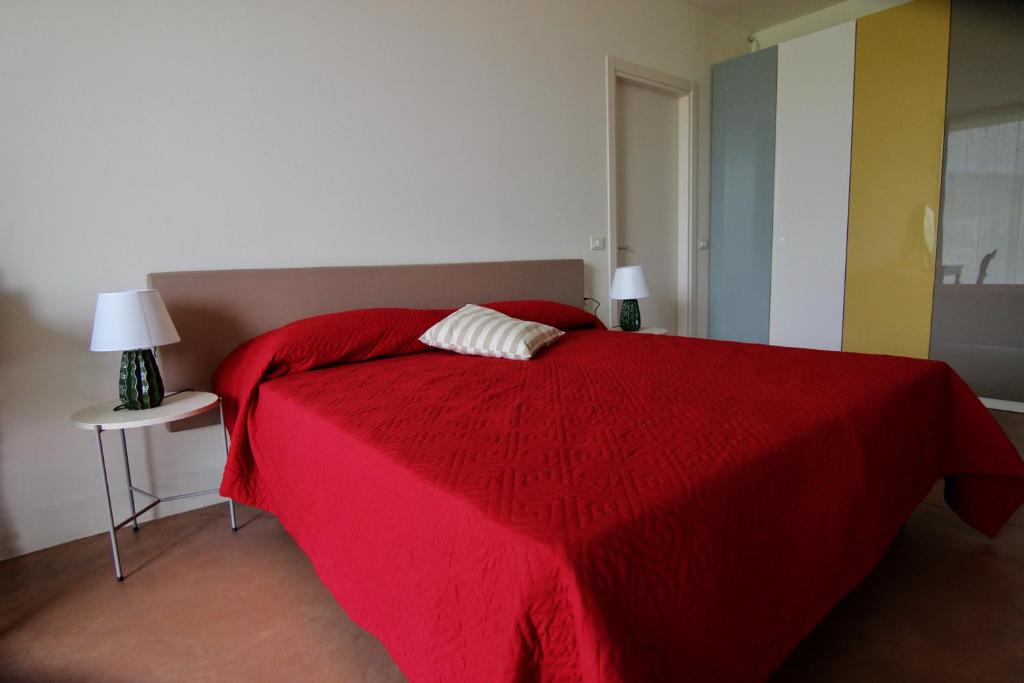 Łóżko lub łóżka w pokoju w obiekcie Relais Mevigo - Casa Padronale