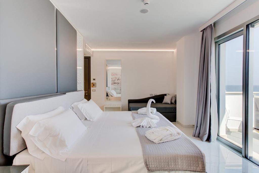 Postel nebo postele na pokoji v ubytování Hotel Due Mari & SPA