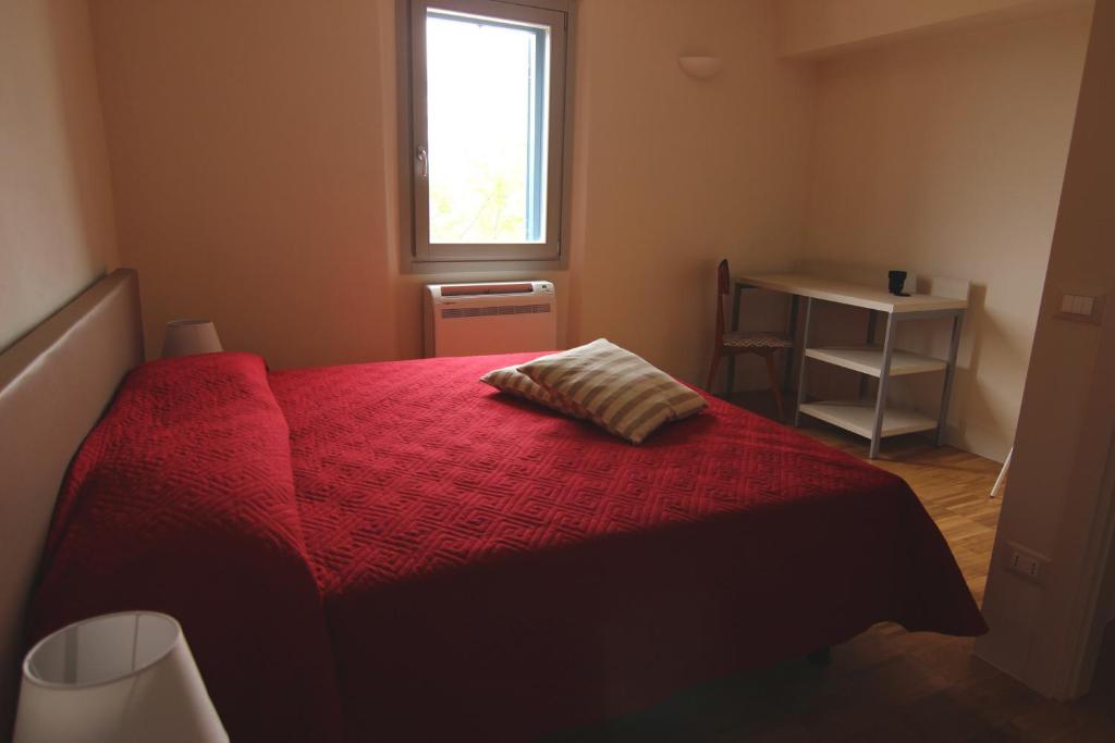 Łóżko lub łóżka w pokoju w obiekcie Relais Mevigo - Casa Padronale
